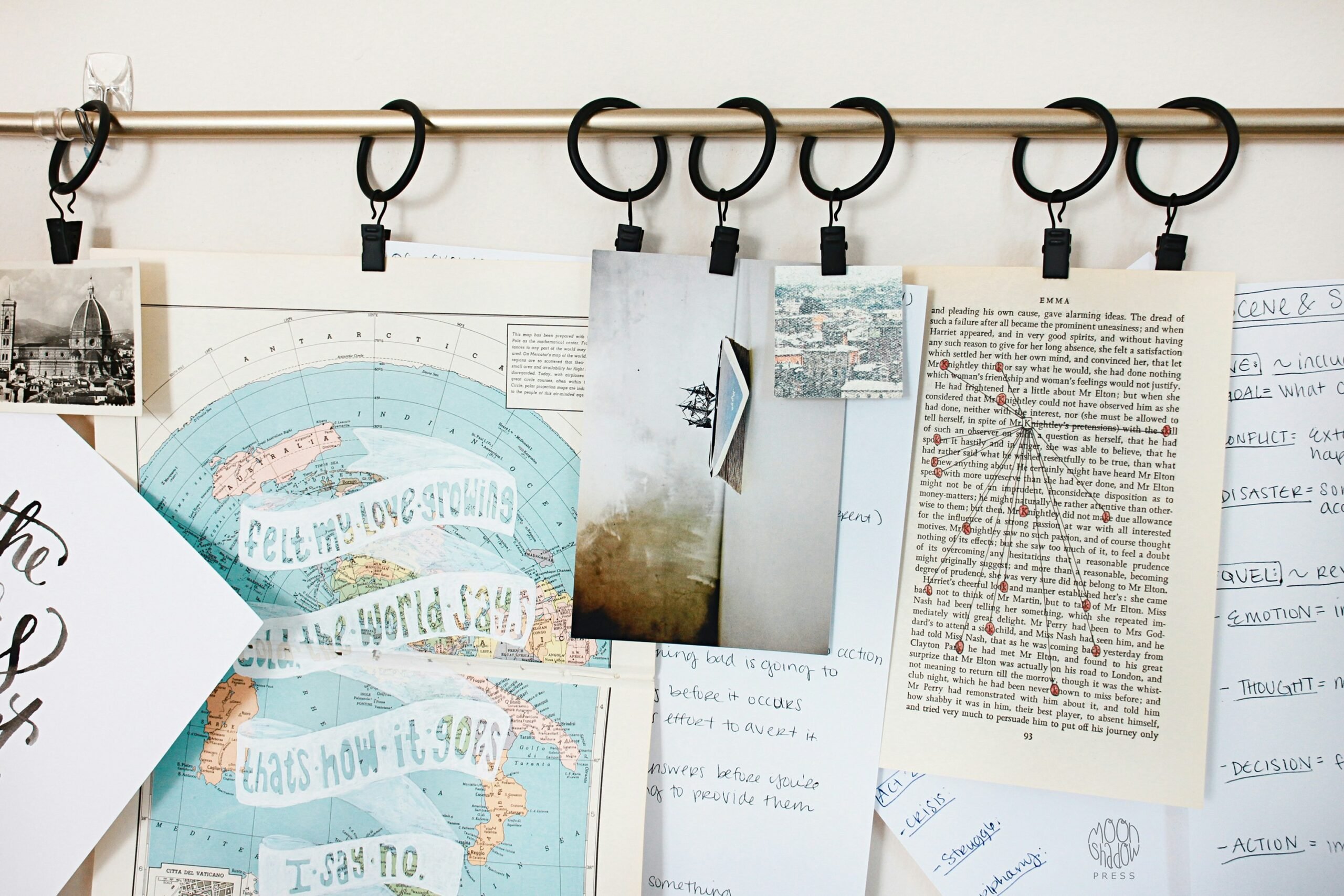 A cluttered desk filled with sticky notes and calendars representing manual campaign management struggles